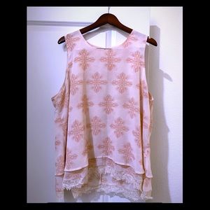 Sleeveless two tiered blouse with lace bottom